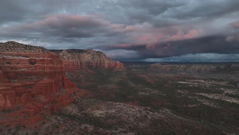 cloudy sky over red rocks of sedona in arizona - drone shot