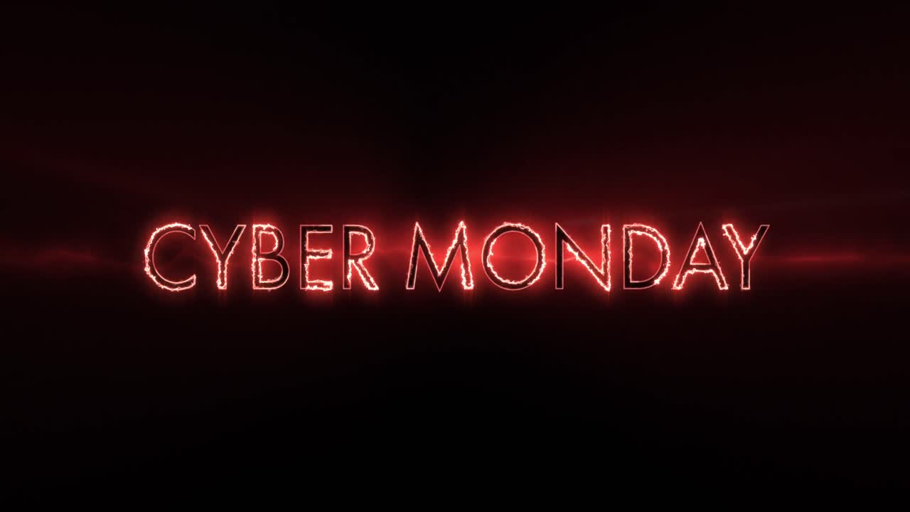 Neon red Cyber Monday text appearing against a black screen 4k
