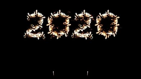 4k. golden fireworks display on number of year 2020 with loop of real colorful fireworks festival in the sky at night with during new year eve countdown celebration