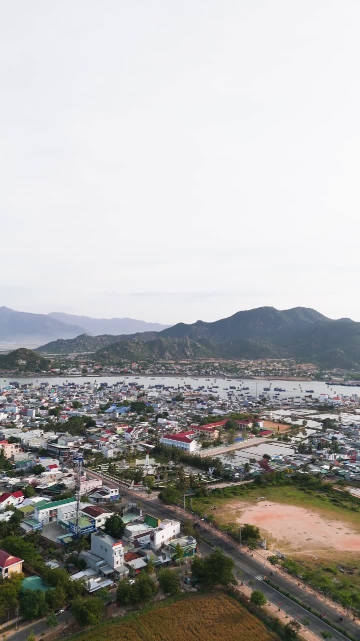 Aerial Vertical Shot Pan of City in Phan Rang–Tháp Chàm.