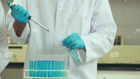 handling test tubes and pipette, scientist analyzing data in laboratory scene