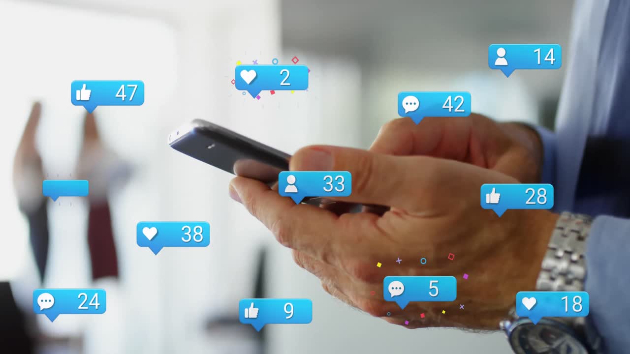 Animation of media icons over caucasian businessman using smartphone