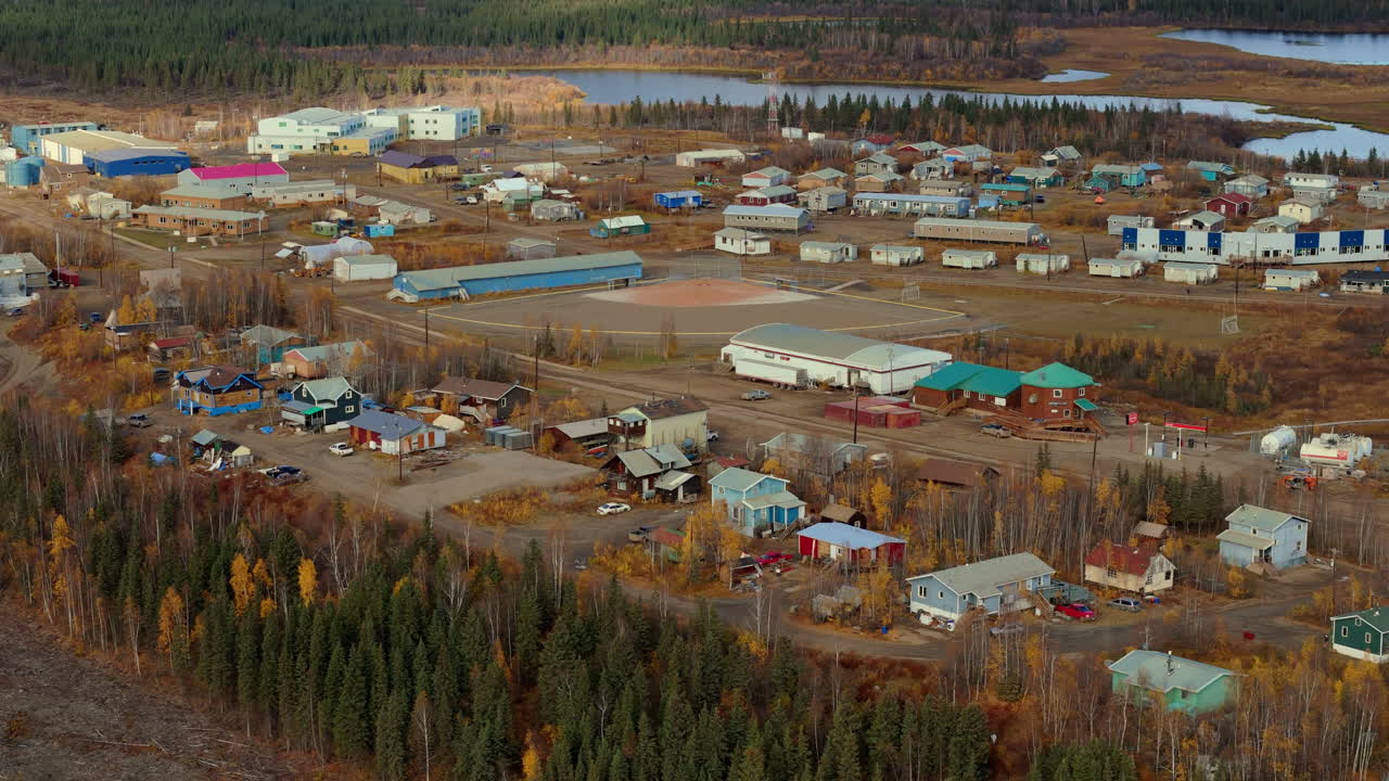 Fort McPherson Village On The Right Bank Of The Peel River In Northwest Territories, Canada. Aerial Shot