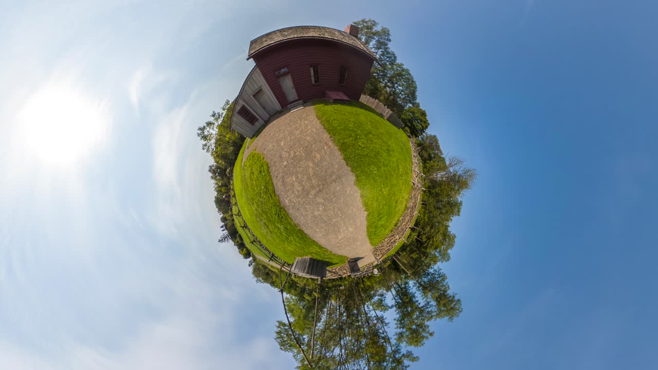 Tiny Planet version of the Historic reconstruction of Mormon leader Joseph Smith's first home with his Wife Emma Where some of the first translations of the Book of Mormon began