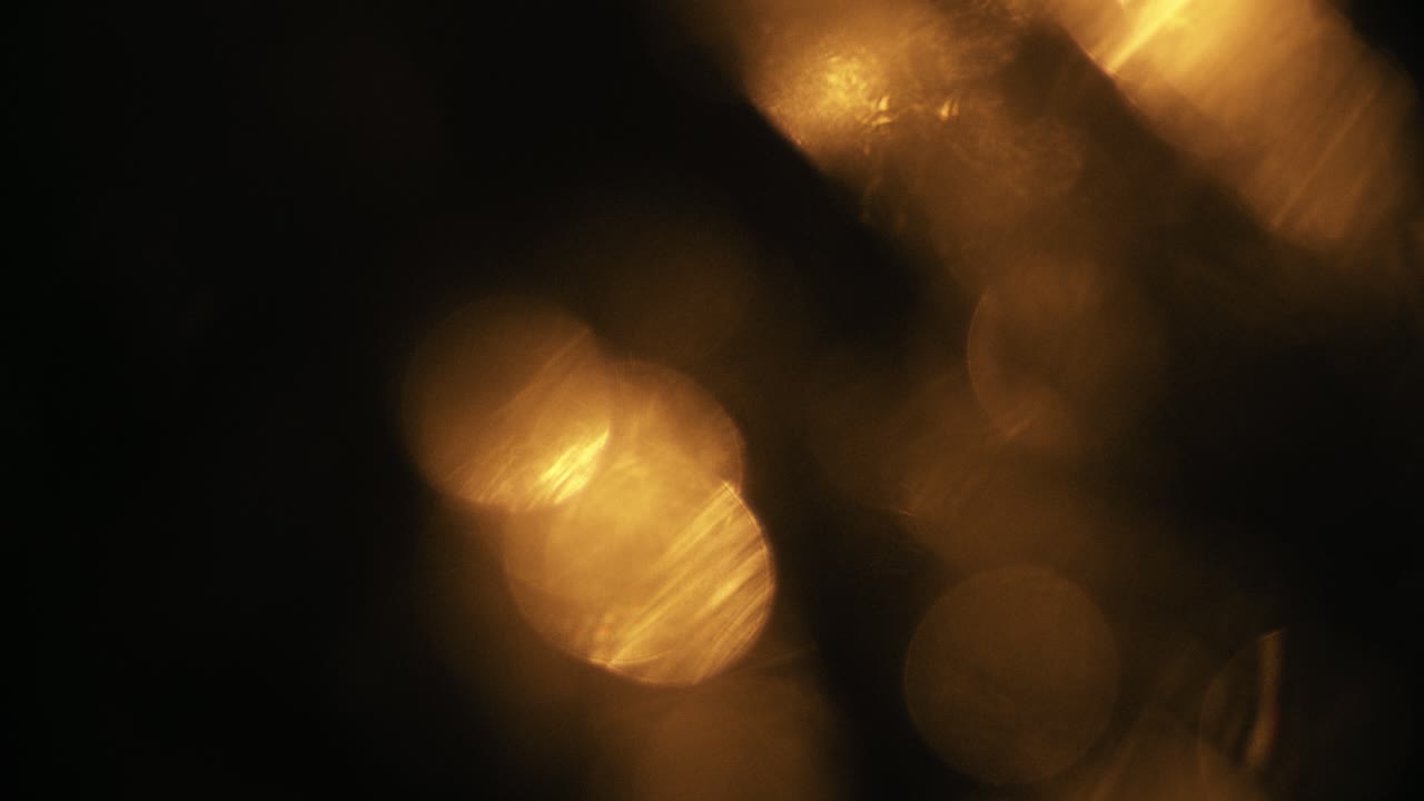 Abstract Golden Light Leaks and Bokeh Overlay Effect