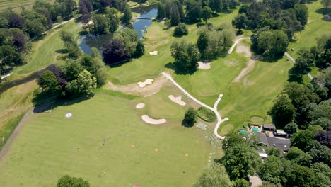 aerial of beautiful green golf course in summer