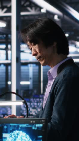 vertical video team leader supervising technicians in server room using ai