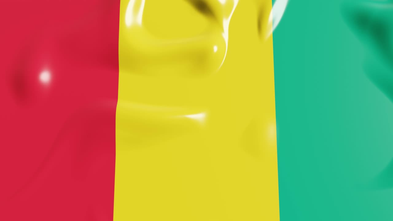 bandera ondeando del país de guinea. 3d render bandera nacional fondo dinámico. 4k realista bucle sin costuras clip de vídeo animado