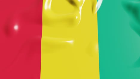 waving flag of guinea country. 3d render national flag dynamic background. 4k realistic seamless loop animated video clip