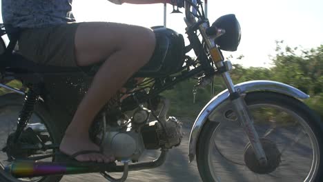 handheld shot of man riding a scooter 2