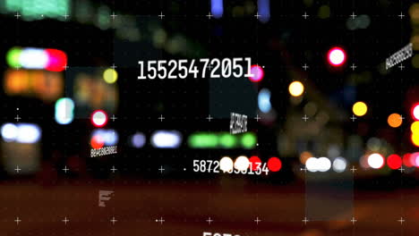 video compuesto digital de múltiples números cambiantes contra el tráfico nocturno de la ciudad