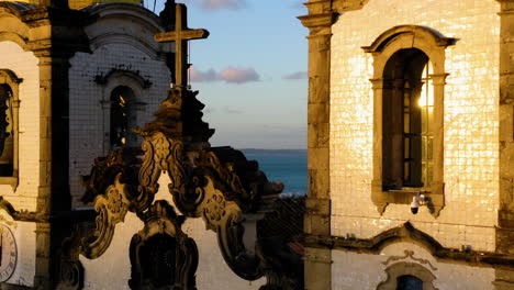 aerial view of nosso senhor do bonfim church, the city around and the ocean at background, salvador, bahia, brazil