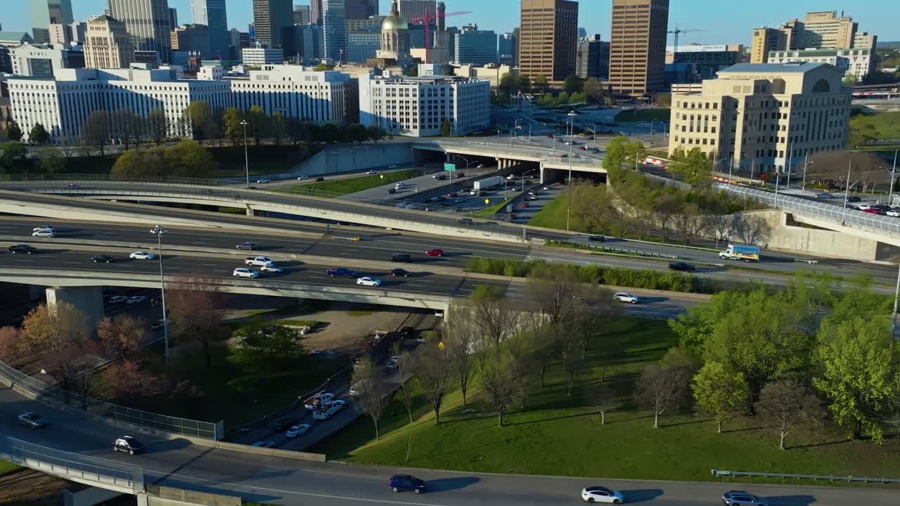 Cars Driving In The Highways With High-rise Buildings In The Background In Georgia, USA. - pan shot