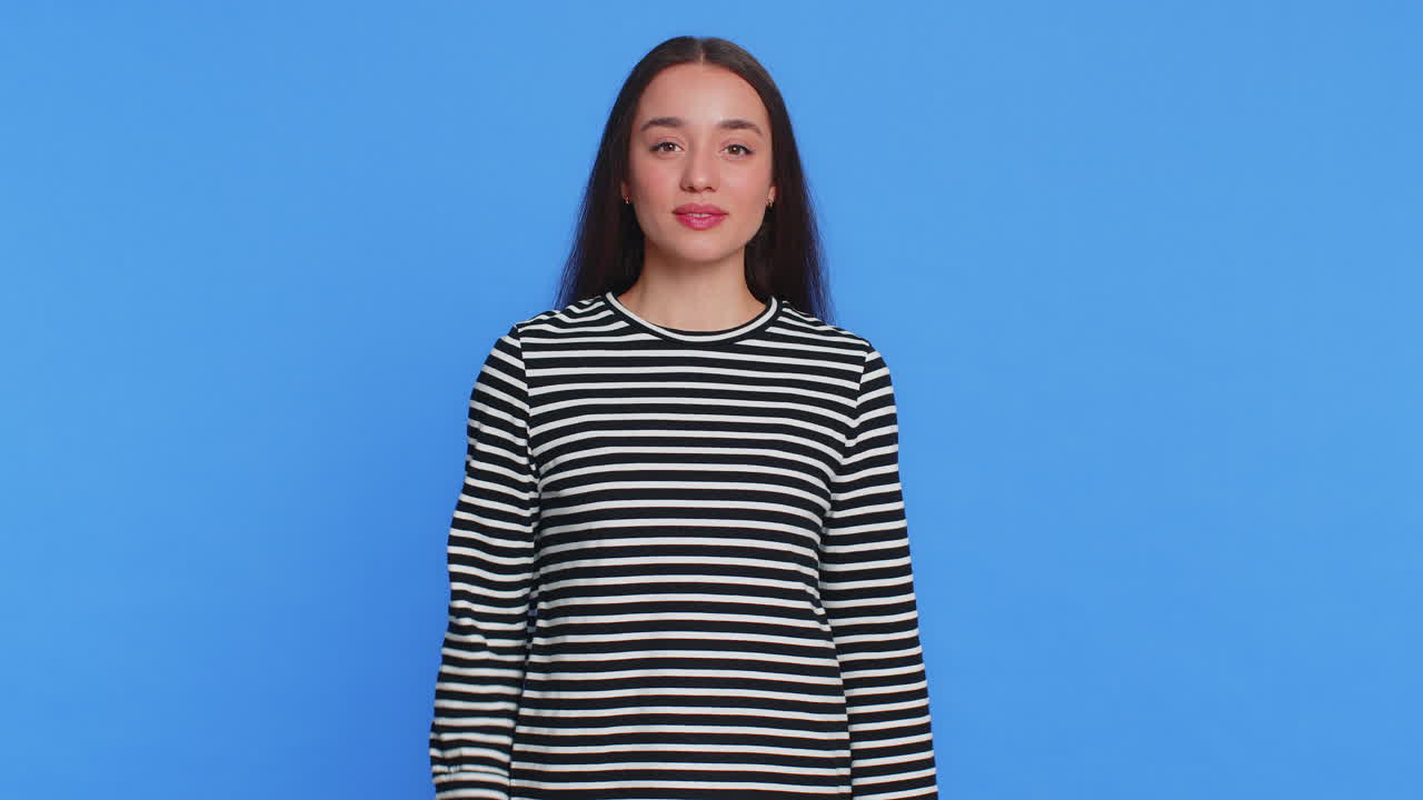 Caucasian young woman outstretching hand to camera offering handshake greeting invitation welcoming