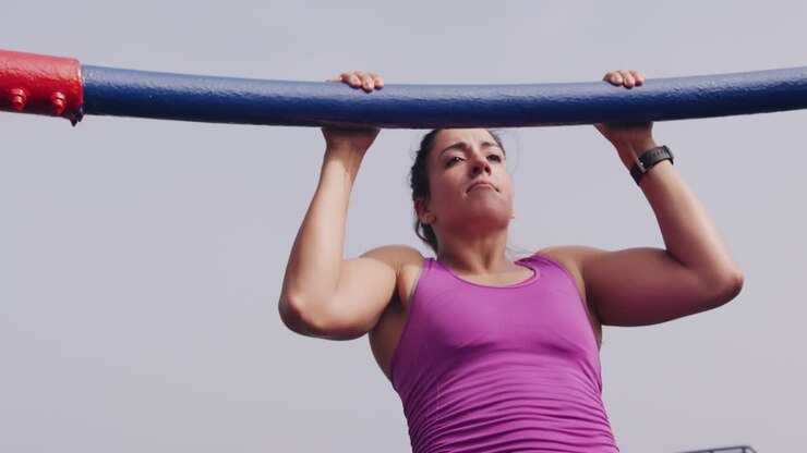 Caucasian woman working out on the docks