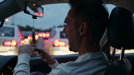 man experiencing road rage and frustration in heavy traffic
