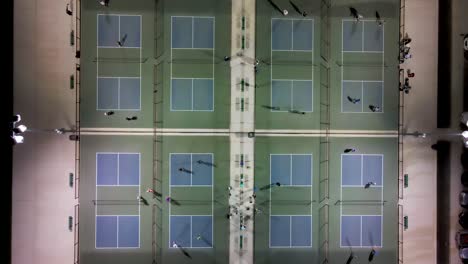 Pickleball-Courts-with-Athletes-Playing-From-Above---Aerial-Drone-Overhead