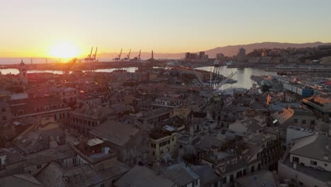 sunset over genoa's historic center with bustling port and cityscape