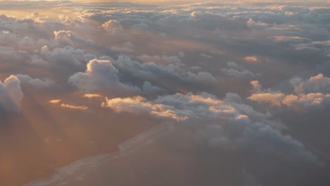 Aerial-view-of-seaside-and-beach-covered-in-clouds