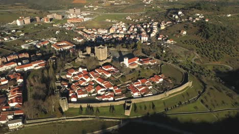 aerial shot around small castle in the north portugal countryside