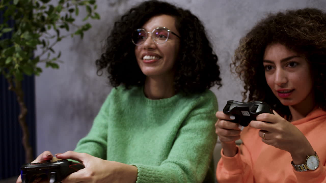 Friends playing videogames