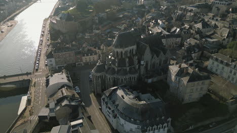 cathedral of our lady of miracles and riverside at mayenne in france