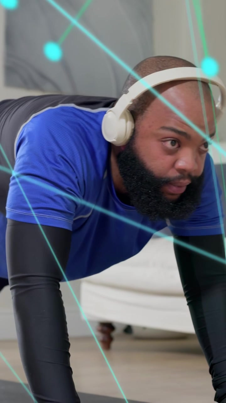 Vertical video: Man starting fitness leaning hands on mat, doing knee drives, teal nodes overlaying