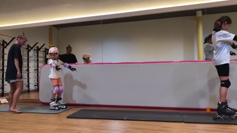 children learning to roller skate
