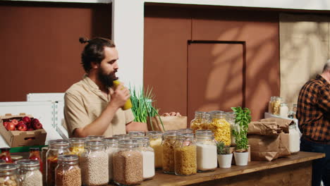 Client-buys-pantry-items-with-paper-bag