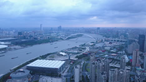 4k cloudy sunset at west bund in shanghai, china