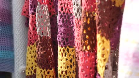 colorful crochet fabrics hanging