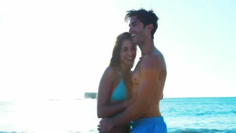 couple romancing at beach