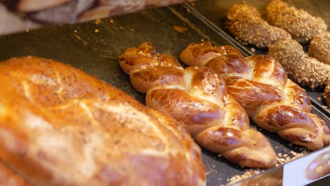 freshly baked bread lies on the shelves ready for sale