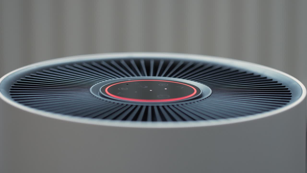 Detailed close-up of a modern air purifier, highlighting its sleek design and smart LED touch display that changes color based on air quality detection