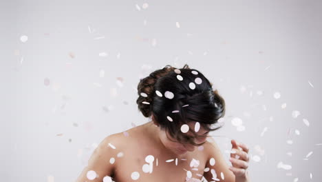 woman celebrating with confetti