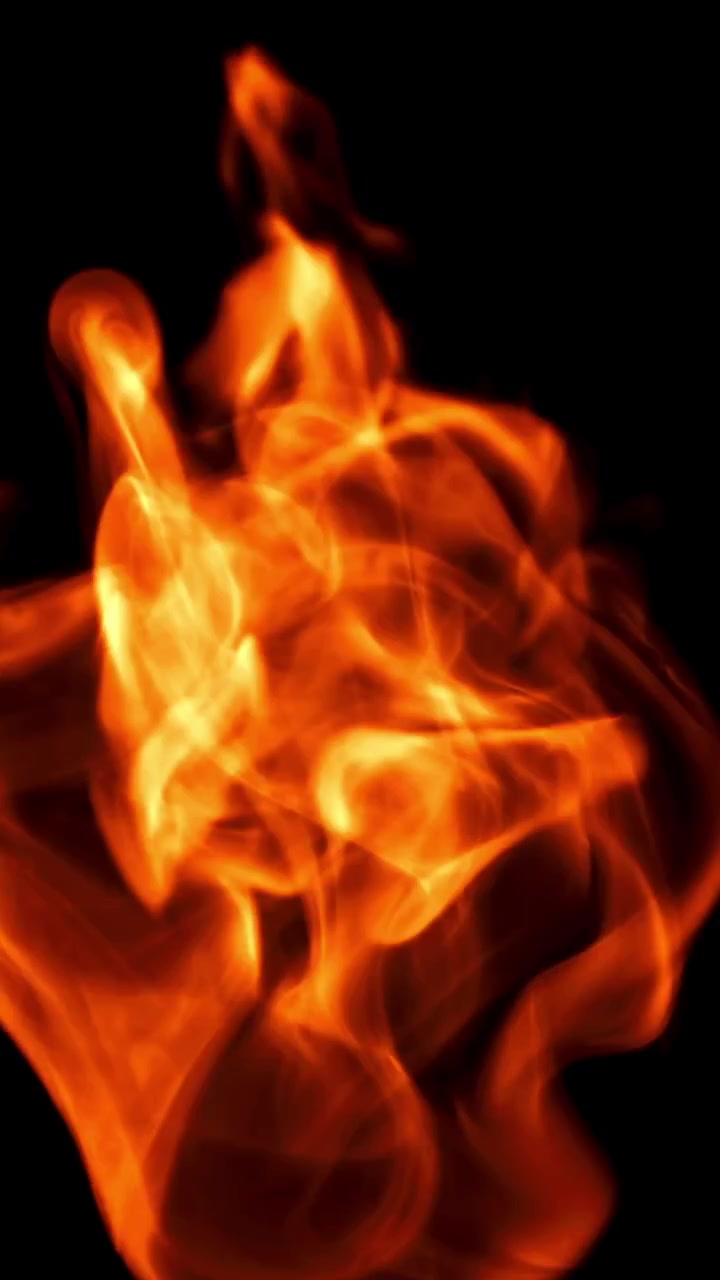 Fiamme astratte di fuoco arancioni e gialle su sfondo nero