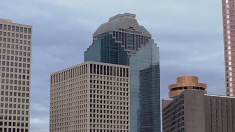 tall building in downtown houston with overcast weather