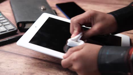 cleaning a tablet screen