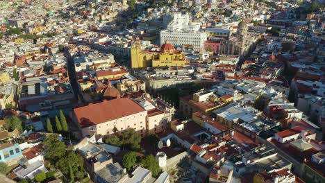 drone approaches guanajuato city center, mexico