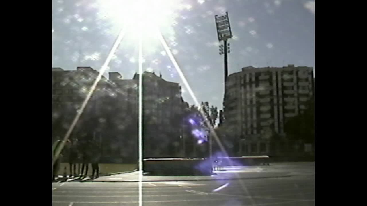 Sun flare over city track and field