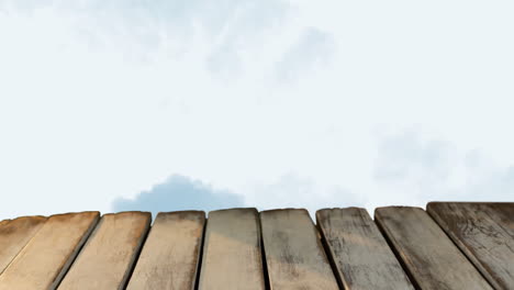 animation of wooden boards over clouds