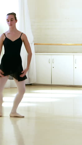 front view of ballerina is dancing