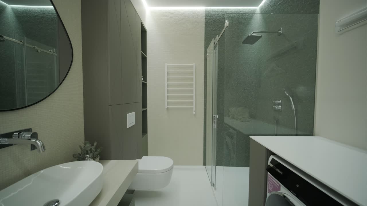Baño compacto moderno con zona de lavandería