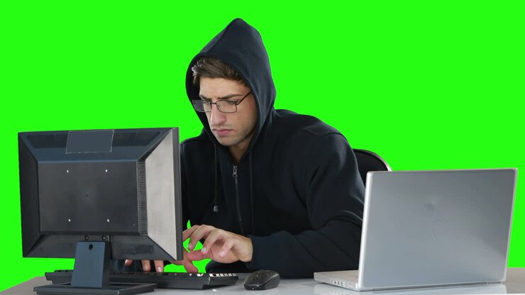Computer hacker using computers