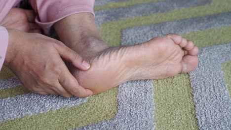 close up on women feet and hand massage on injury spot