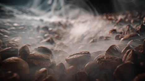 close up of seeds of coffee. fragrant coffee beans are roasted smoke comes from coffee beans.