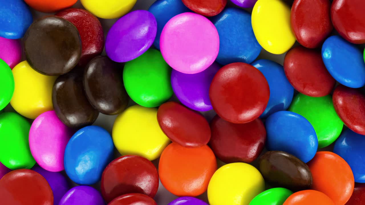 Sugar Coated Chocolate Candies Rotating