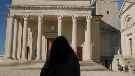 woman visiting a historical church in italy