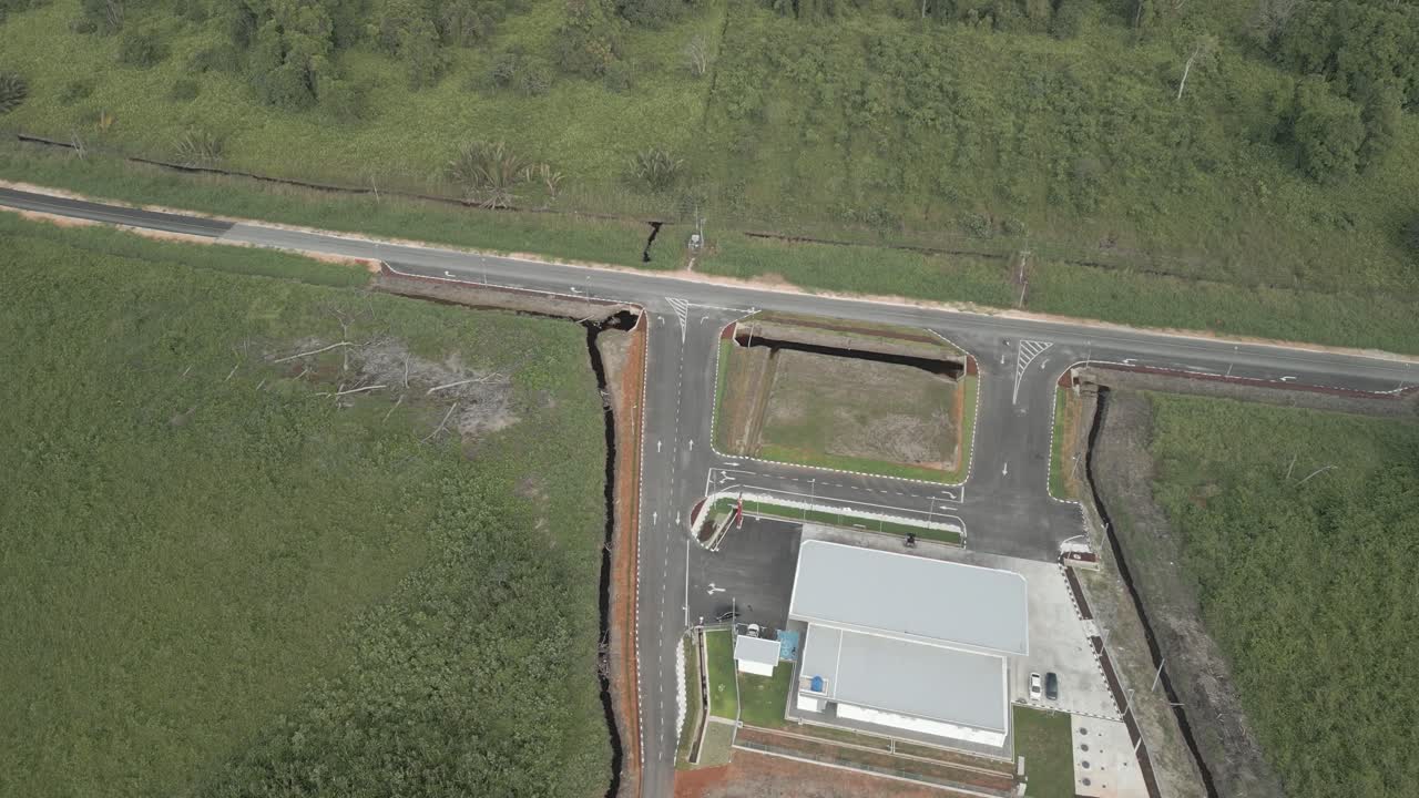 Aerial Drone View A Petrol Station On The Way To Batang Lupar Ferry Terminal And To The New Bridge Project Under Construction,When Complete Will Conected Both Side For Transportation