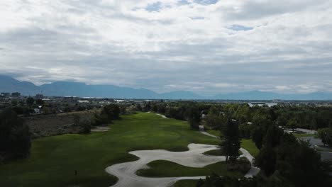 Sand-trap-at-a-golf-course-in-suburbs-of-Lehi,-Utah---aerial-flyover